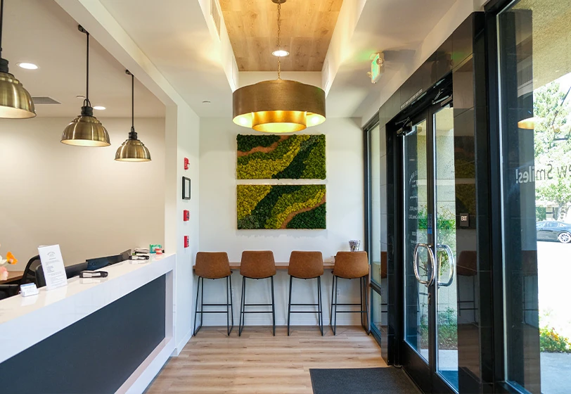 waiting room and front desk at Roseville Dental Company in Roseville, CA